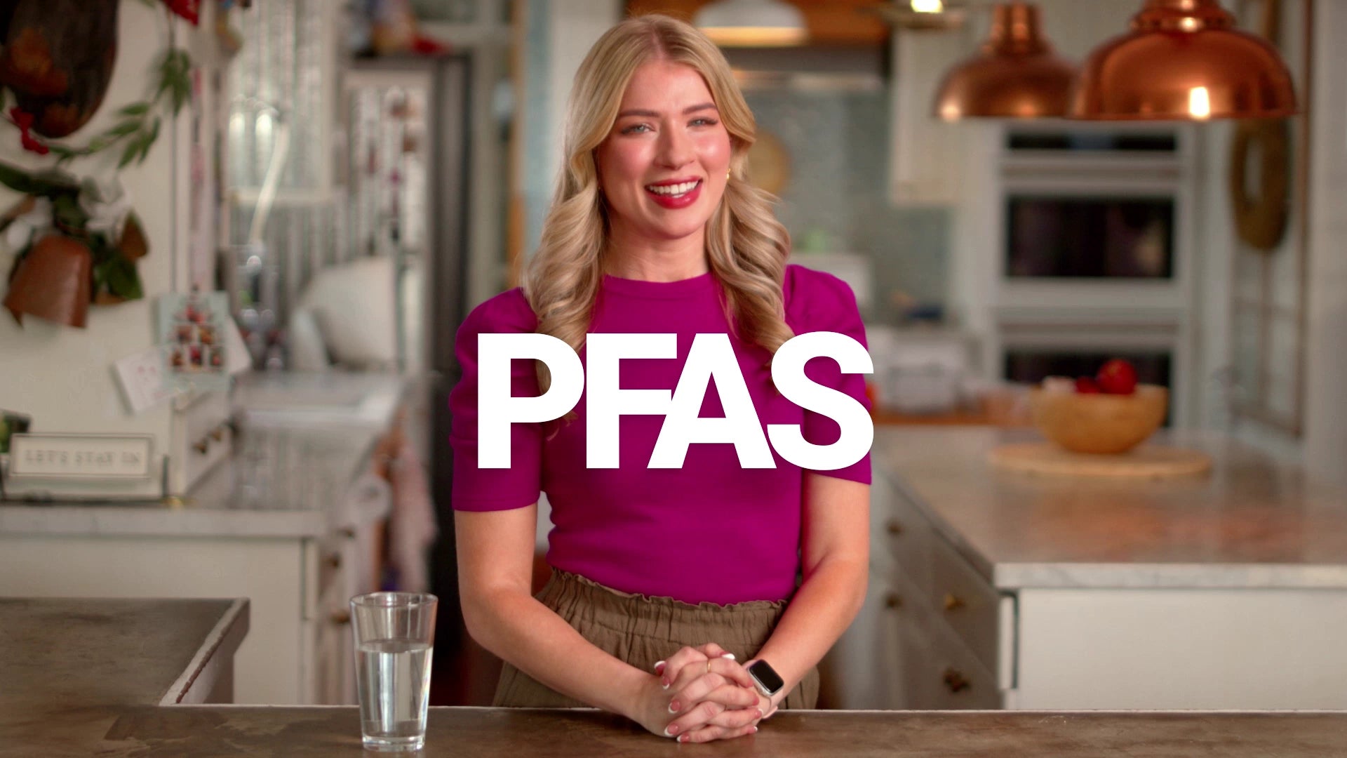 Woman in a kitchen with 'PFAS' text overlay
