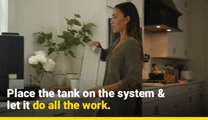 Place the tank on the U1 water filter system