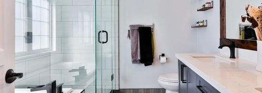 Bright U.S. bathroom bathtub filling with clear water in natural light