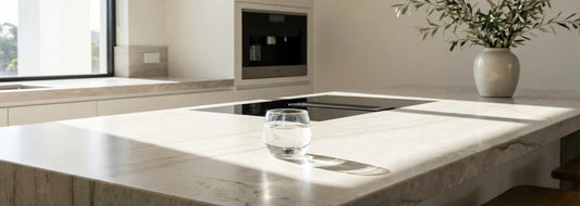Clear glass of water on a bright kitchen counter